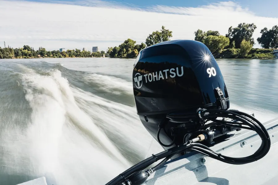 Tohatsu outboard throwing a wake